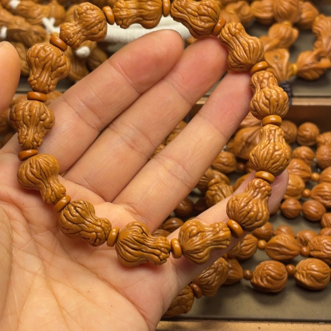 用***7桃核手串龙纹桃核7