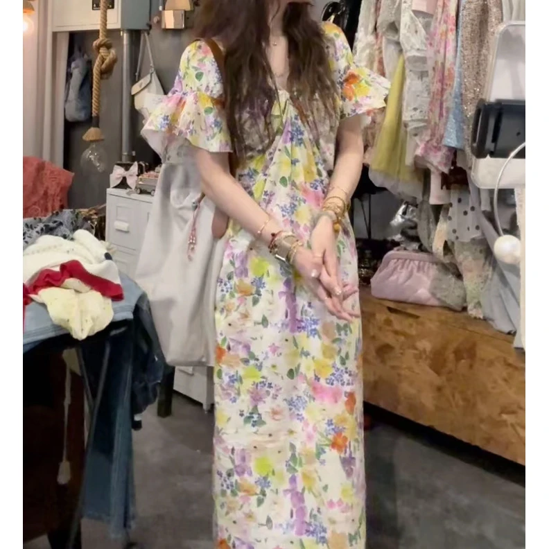 Q50704735定制韩系田园风碎花V领开叉荷叶袖显瘦连衣裙