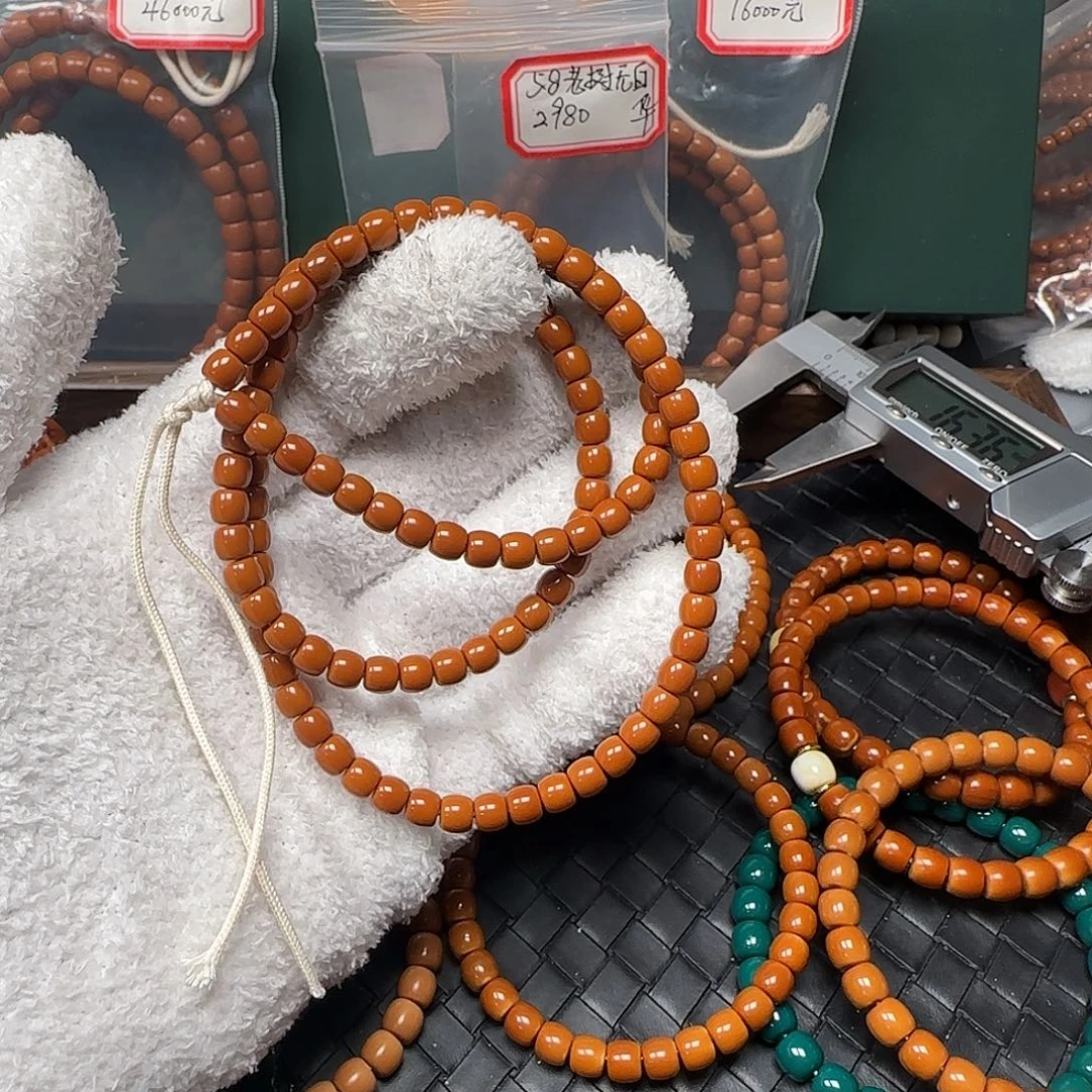 禧***岳橄榄核吊坠5.9mm老挝核尖极限弧108全无白