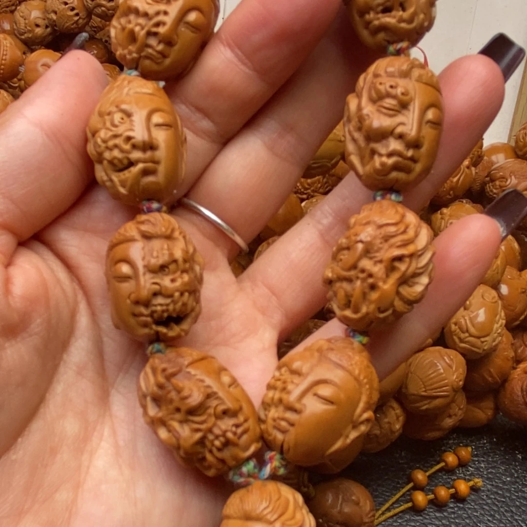 骑***亮橄榄核吊坠一念之间