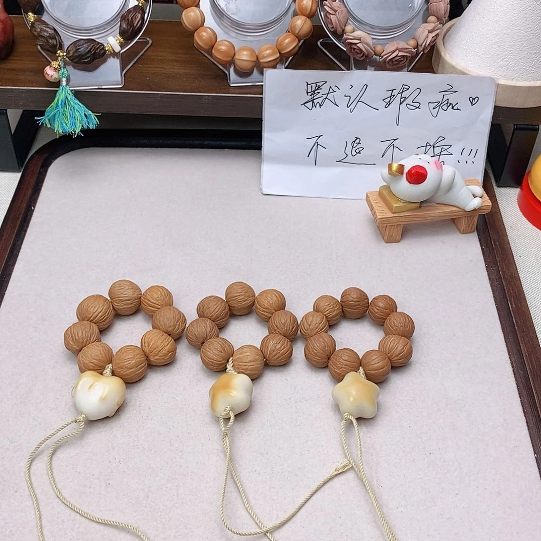 菩提根/象牙果手串凤羽手捻