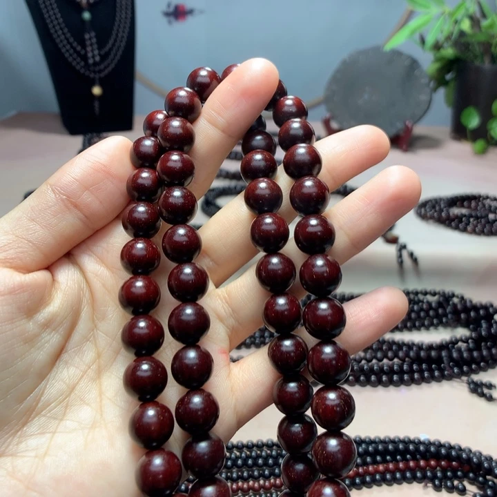 沈***K小叶紫檀吊坠36颗手持