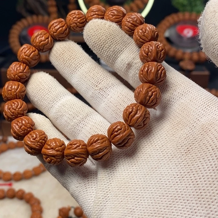 桃核吊坠老****j秦岭龙纹桃核