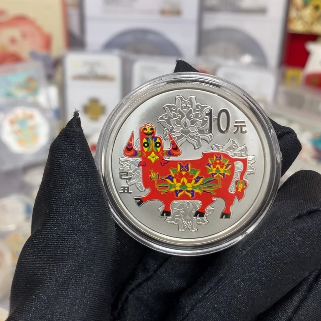 纯银09彩银牛带证书配盒