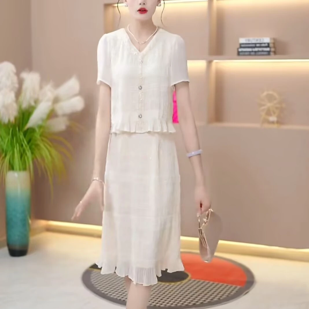 春夏气质新款连衣裙V领拼接优雅蕾丝减龄中长款裙