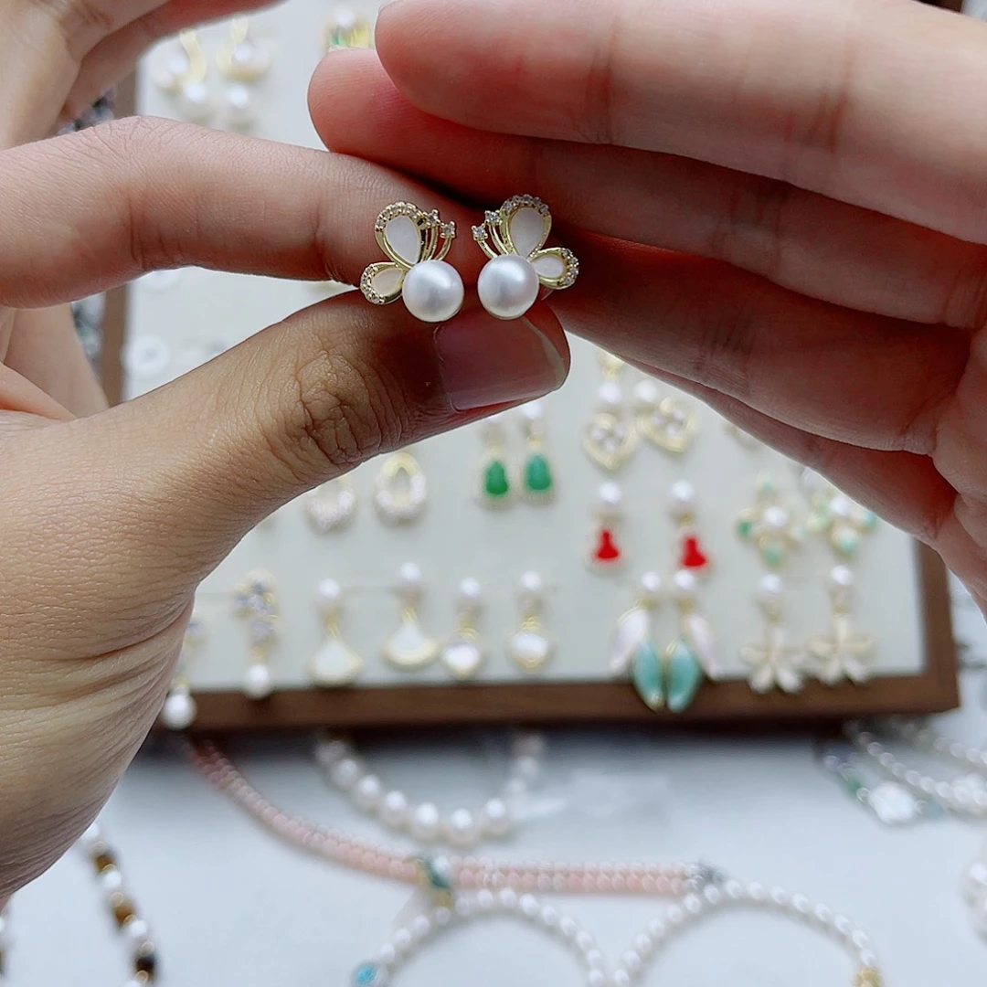 淡水珍珠银S925镶嵌耳饰