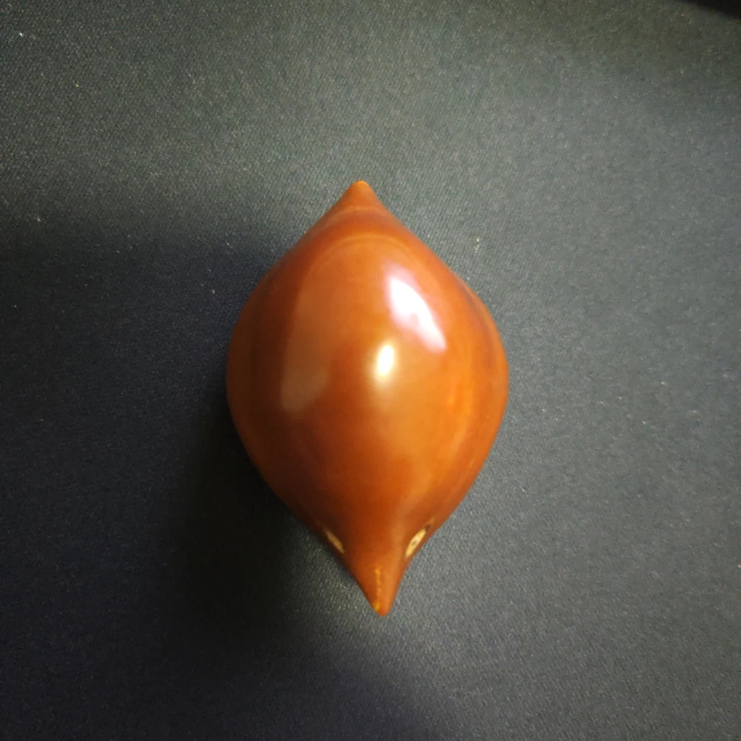 橄榄核雕生命手把件