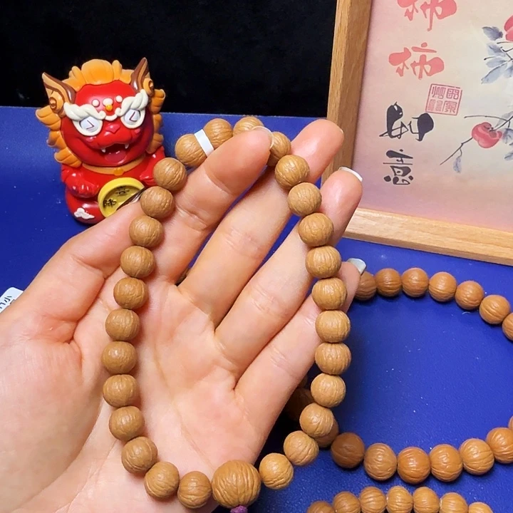 鑫***哥猴头核桃吊坠凤羽