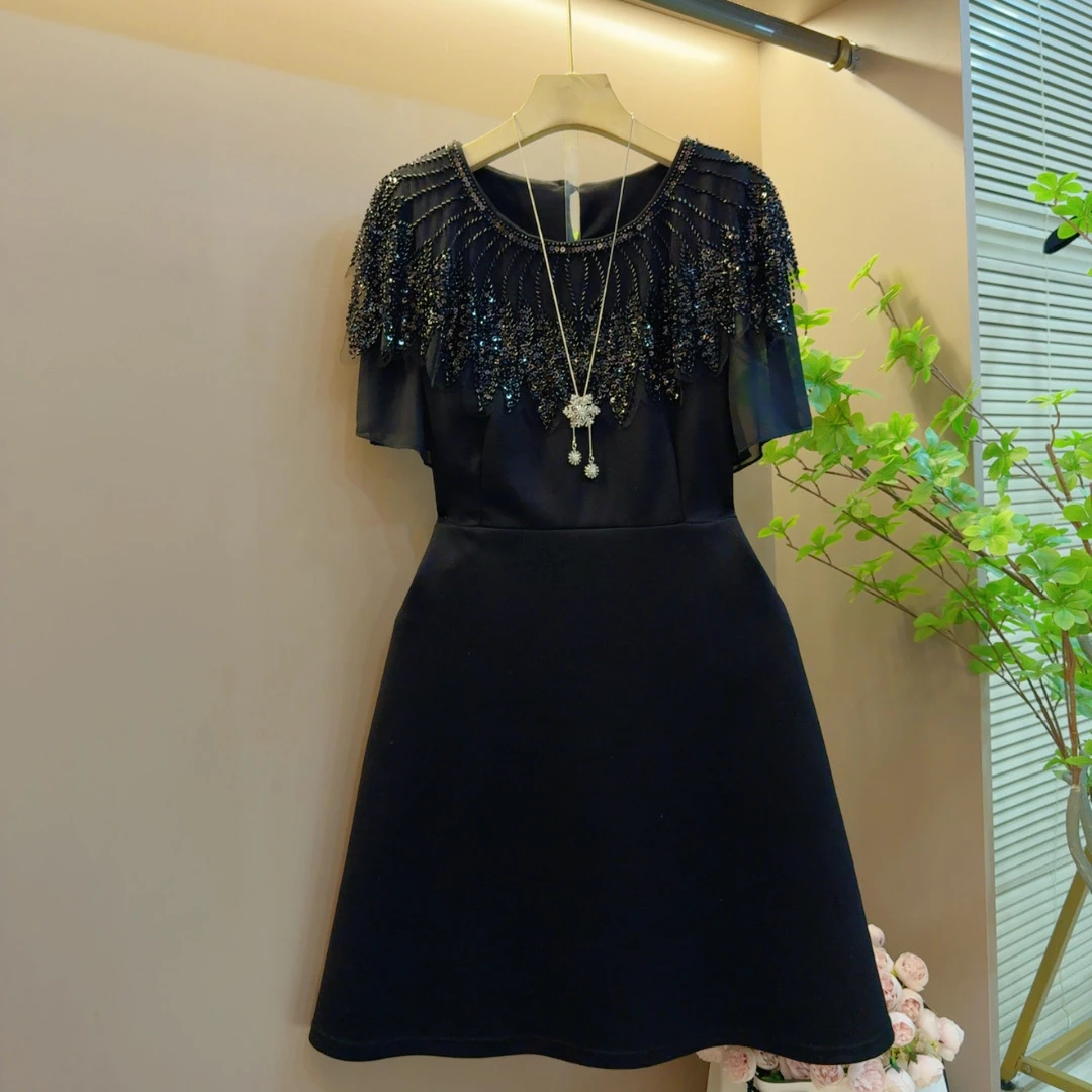 2025欧洲站重工钉珠收腰显瘦气质时尚黑色连衣裙（长88左右）