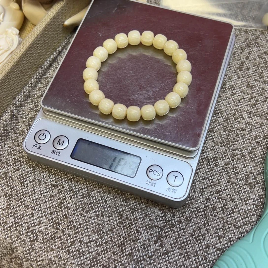 善***生猛犸象牙其他海胖脑花手串
