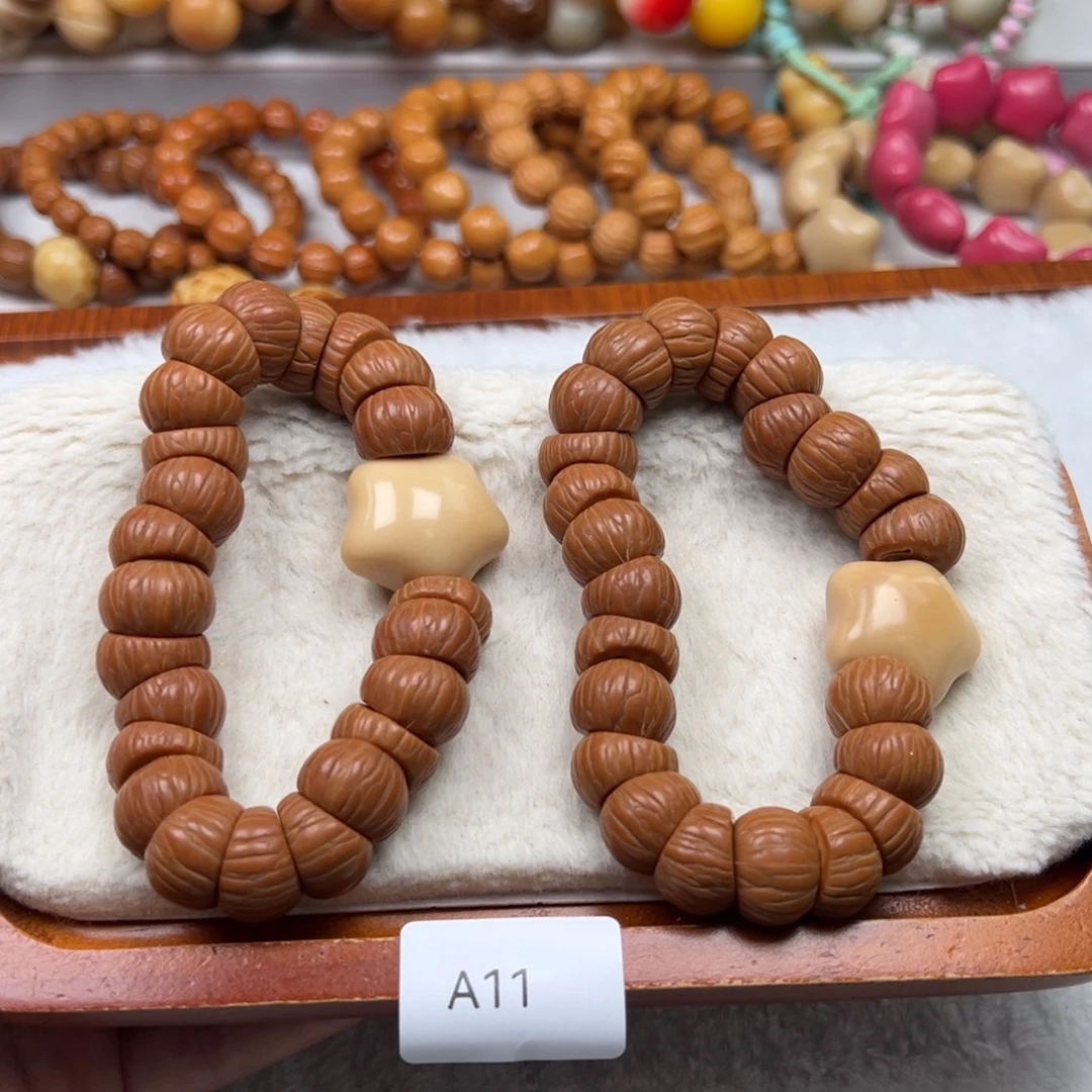 菩提根/象牙果吊坠瑕a11凤羽随机一串14m