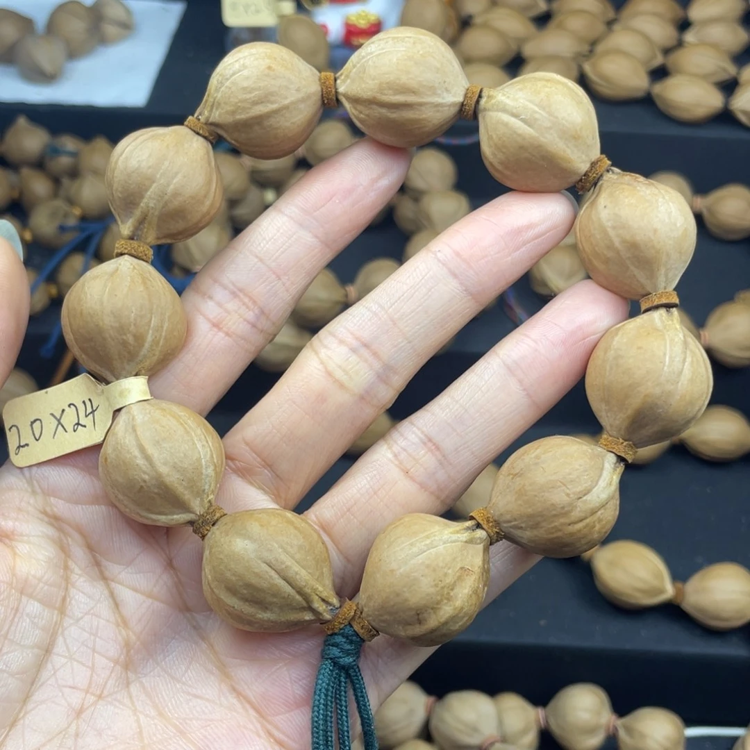 ****人005橄榄核三花20*24