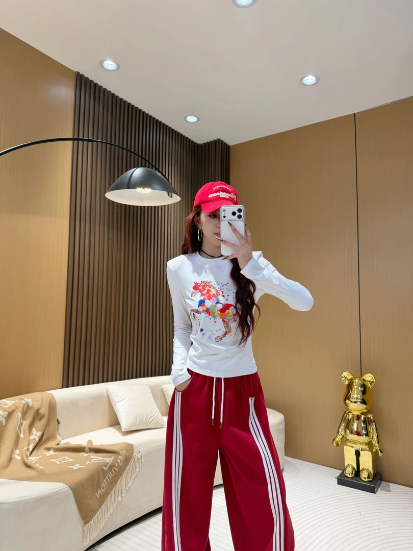 DA672卡通小马印花T恤 春季新款显瘦长袖时尚休闲百搭上衣女