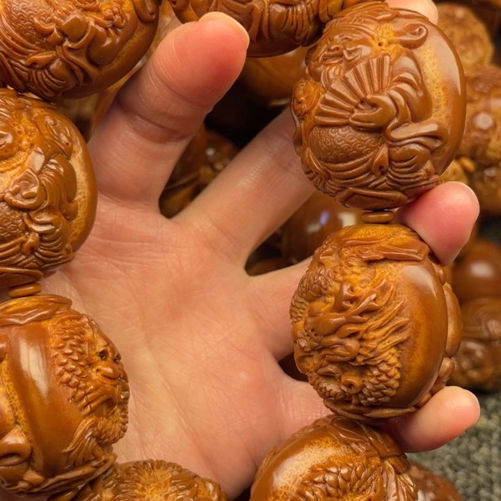 橄榄核吊坠交***友橄榄核手持