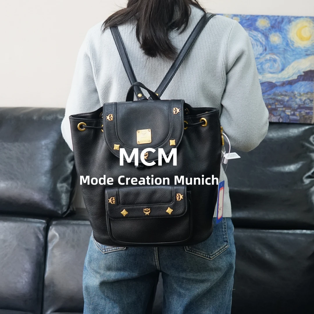 95新 MCM 黑金双肩包/WJ02414504/4504
