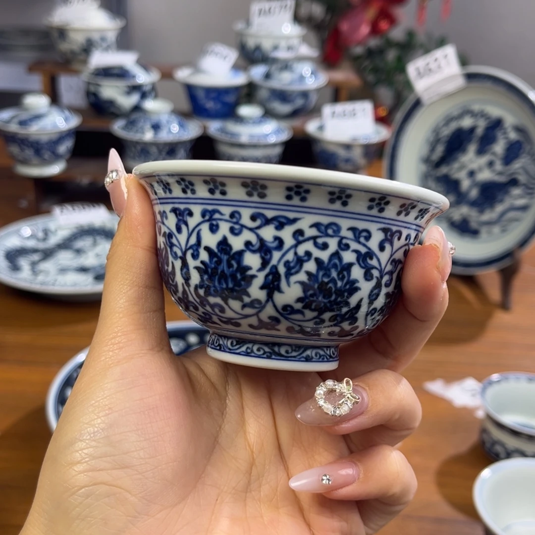 青***發陶微瑕缠枝花压手杯