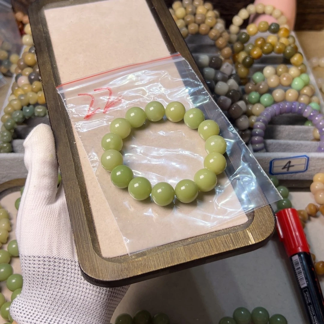 玛****菩提根/象牙果手串22号阳光玫瑰卡14.4  实物会更绿