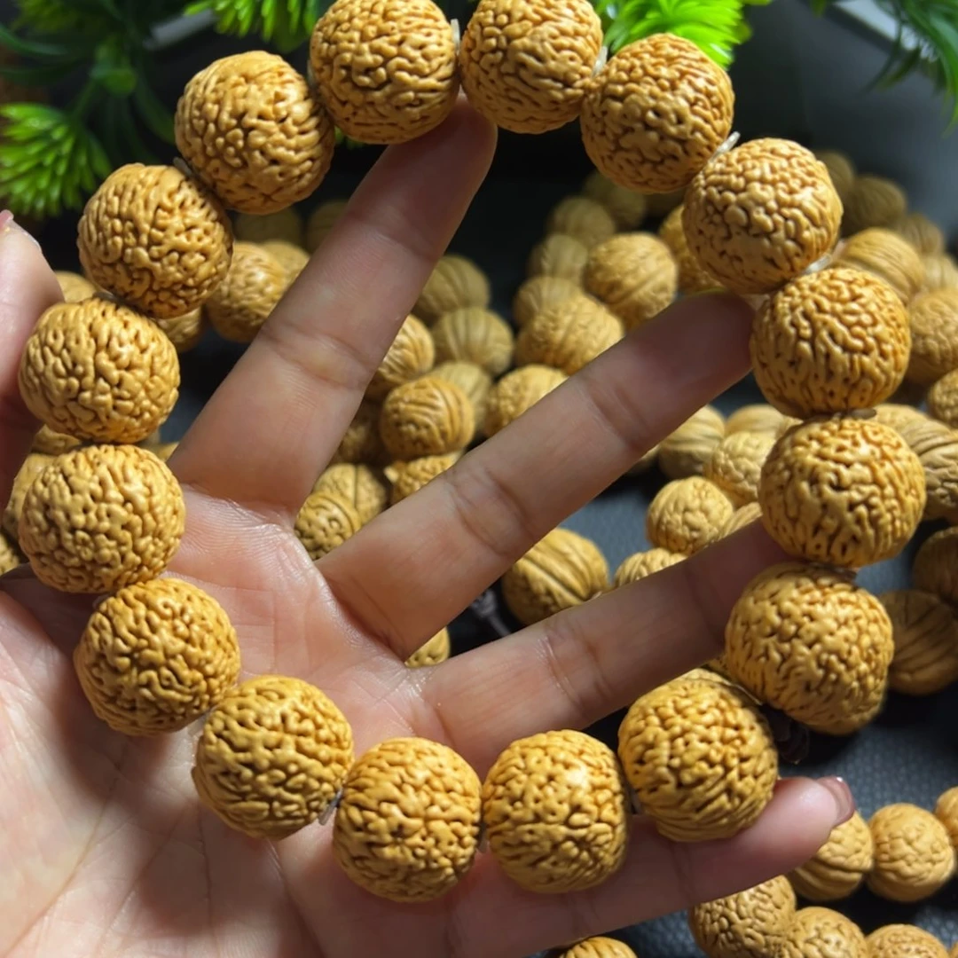 无事牌桃木龙鳞凤尾桃核手串