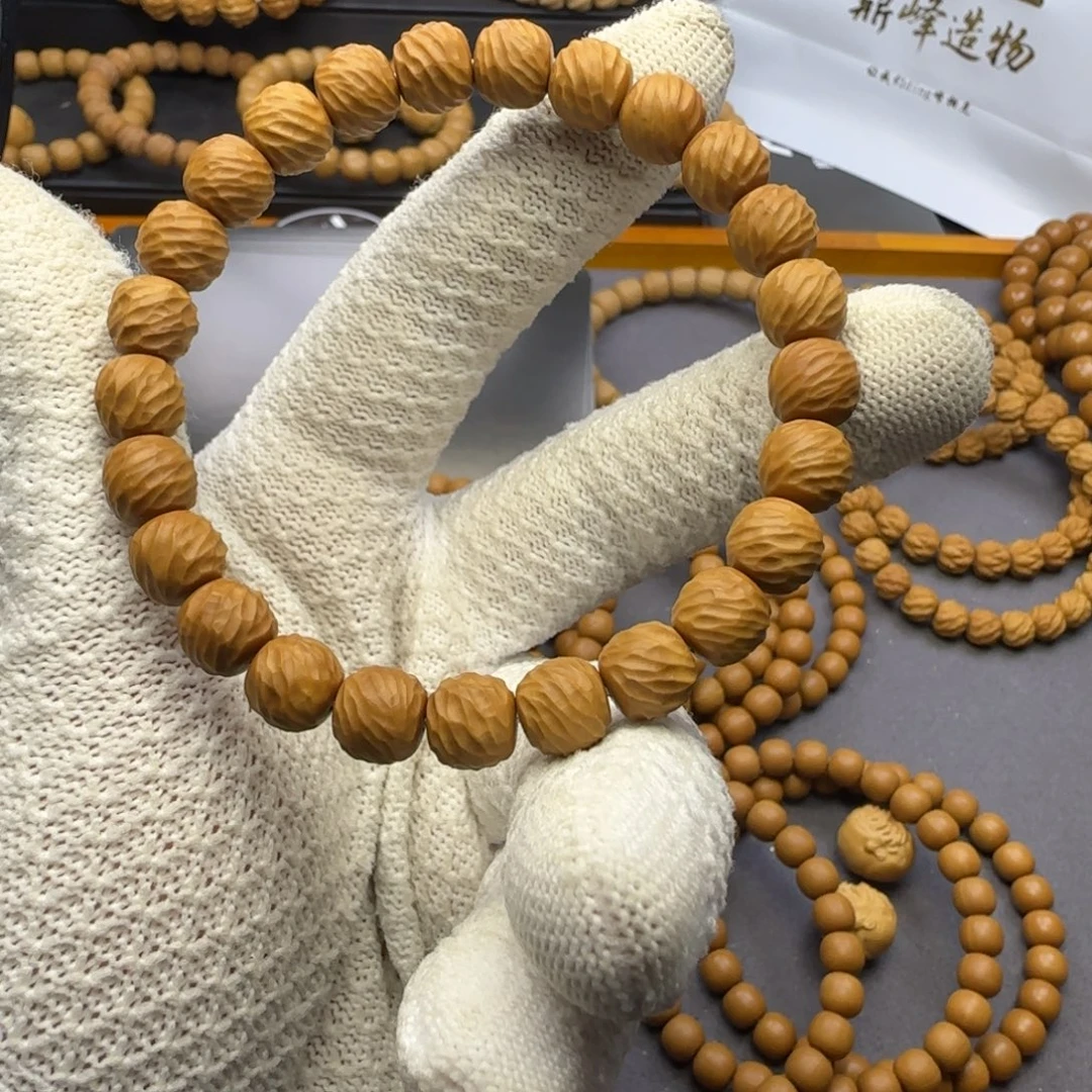 回***海猴头核桃吊坠手工云锦