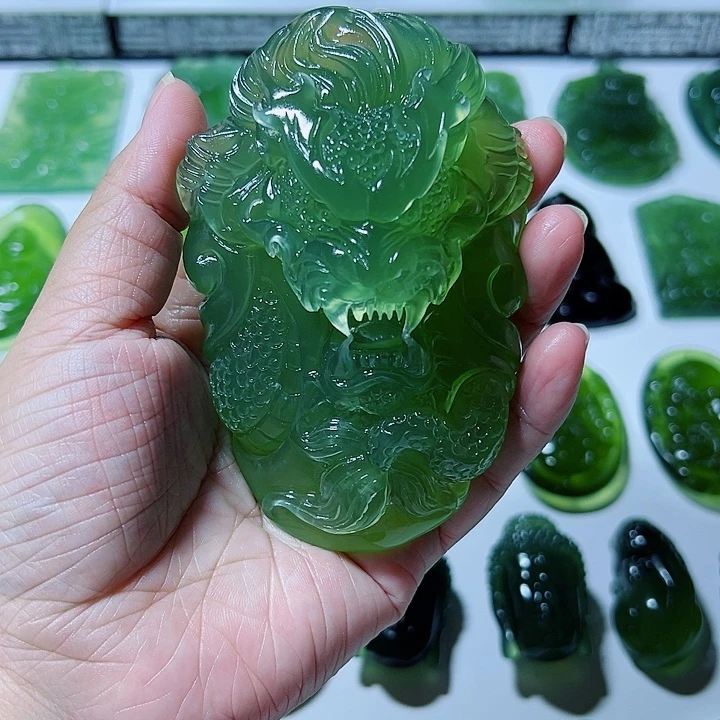 铁***铮合金蛇纹石玉手把件