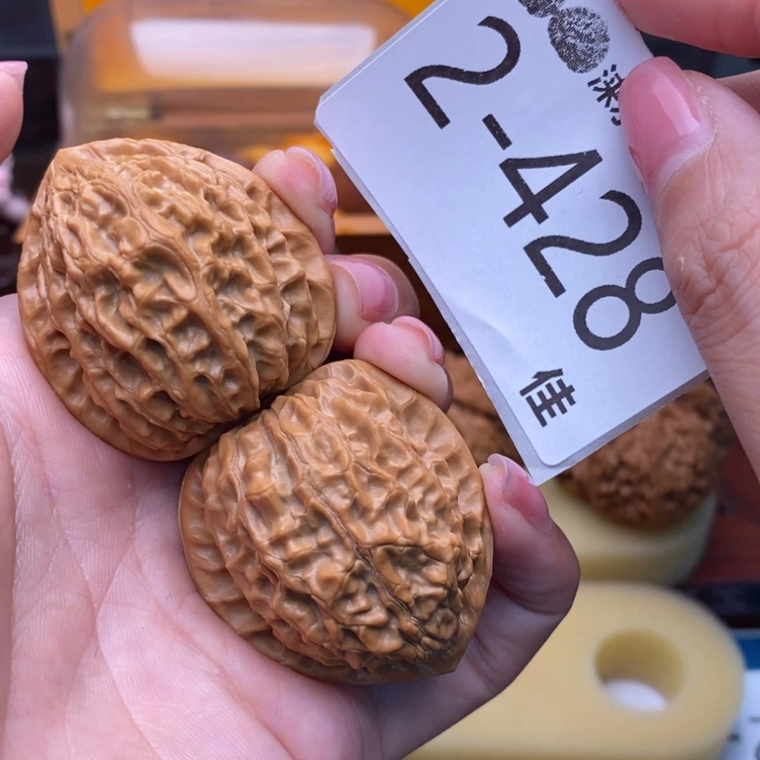 文玩核桃把件38金牛