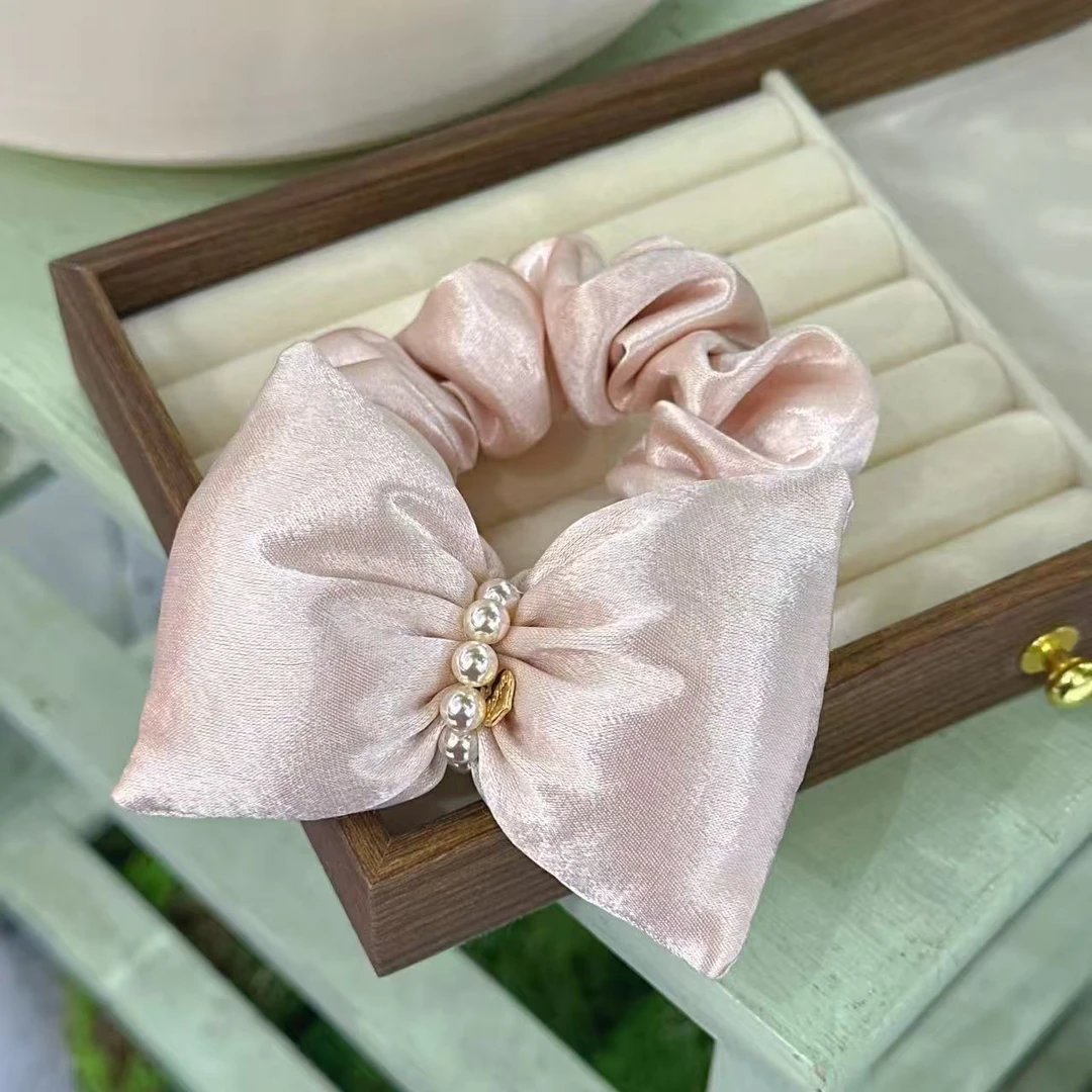 精品极光珠韩系新款精致粉色枕头蝴蝶结发圈WM-1428