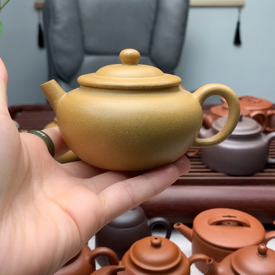 紫砂茶壶微瑕放漏黄金段笠帽