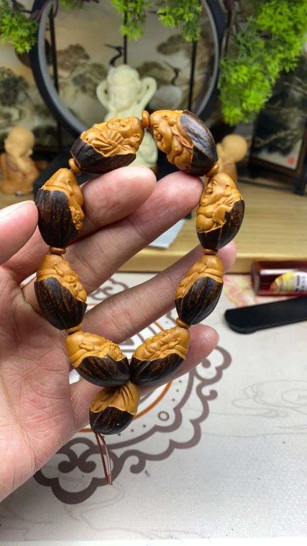 橄榄核雕工艺手串小紫皮弥勒