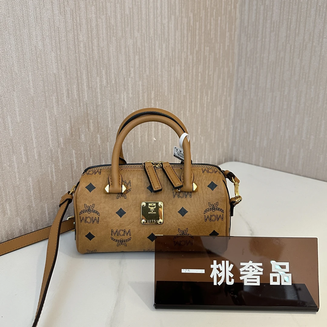 95新 MCM 一桃/98新/mcm 干邑色波士顿手提斜挎