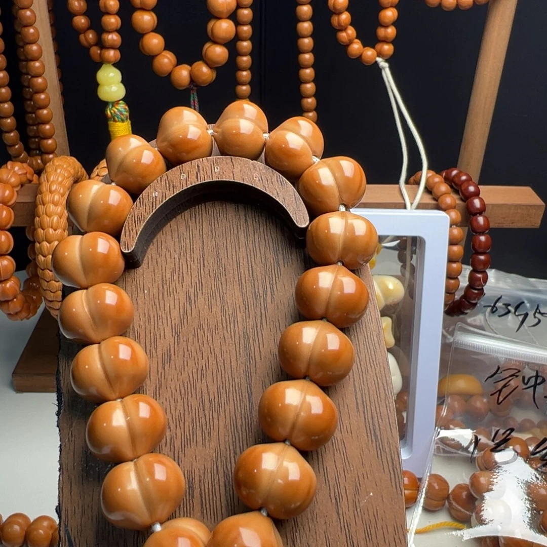 雕***军猴头核桃手串猴头