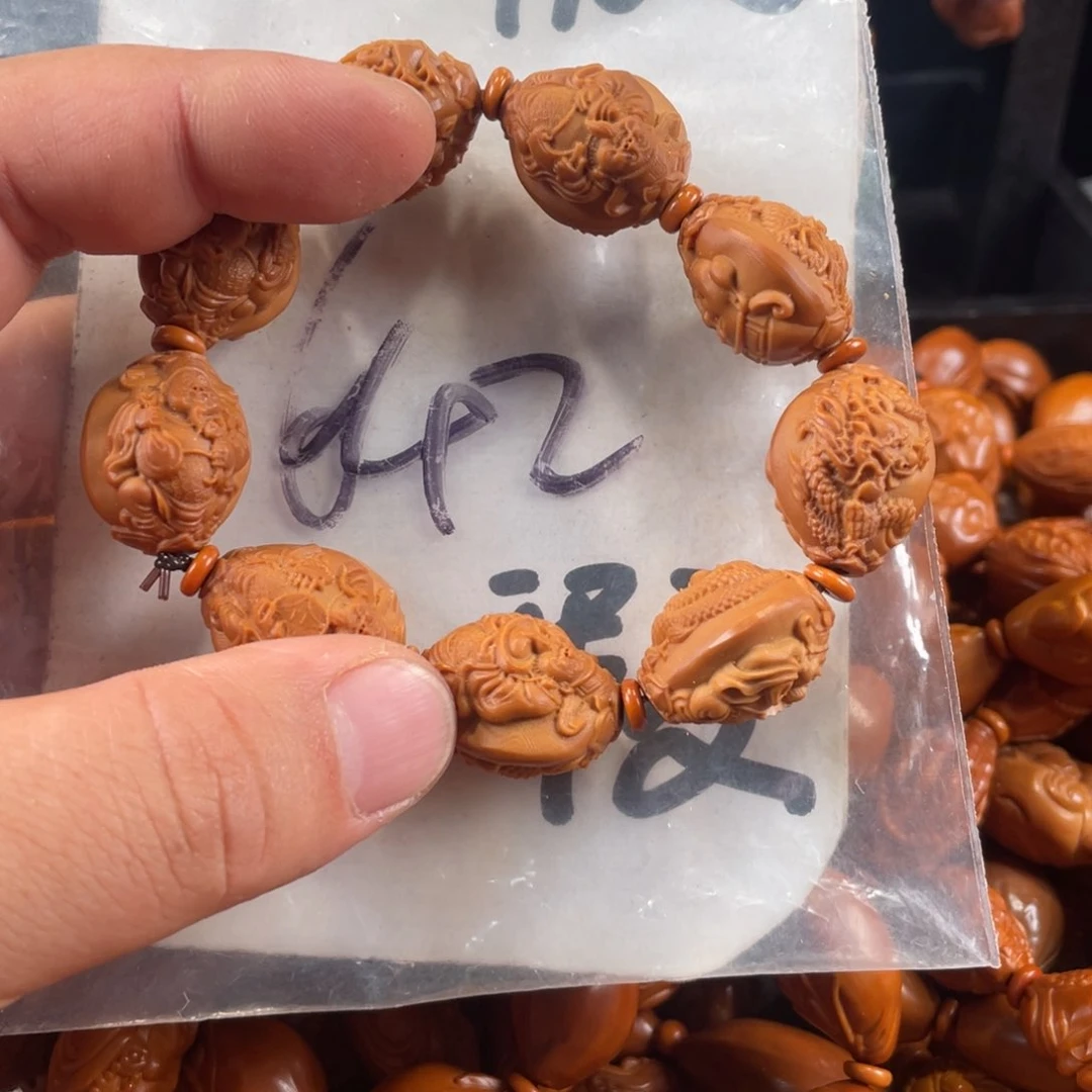 橄榄核其他橄榄核雕工艺手串 瑕疵介意勿拍