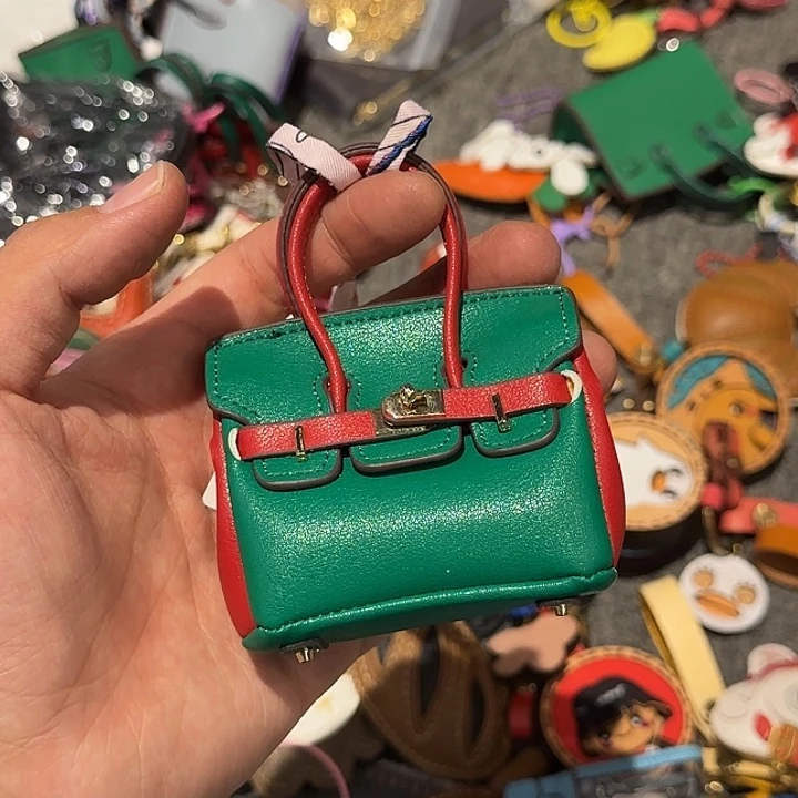 梅***梅犏牛皮（革）手工皮具包包