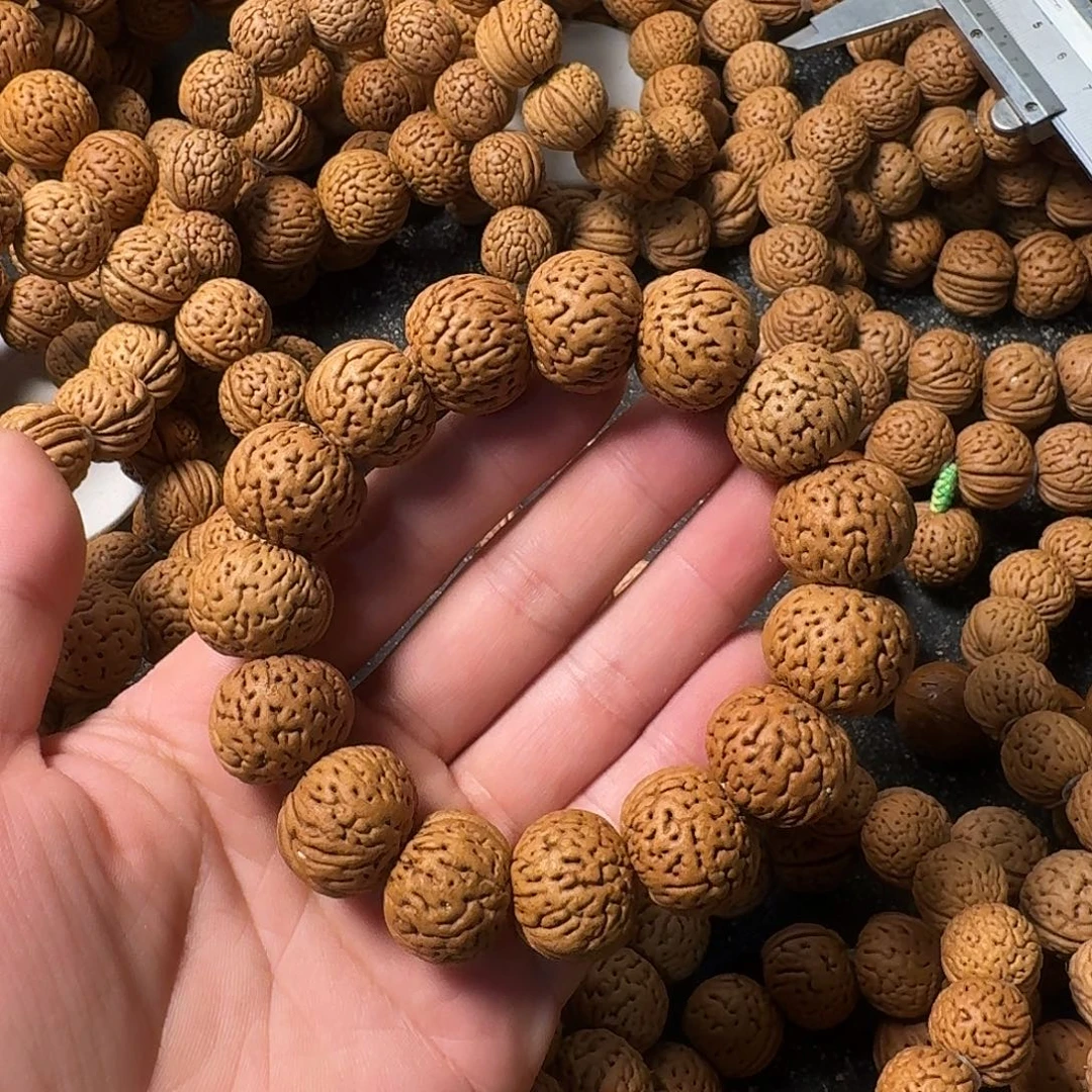 暴***龙桃核吊坠苹果园手串