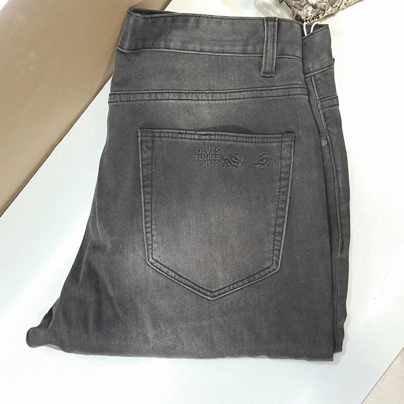 狼的-国内牌 经典天丝原单货夏薄修身弹力牛仔裤3536