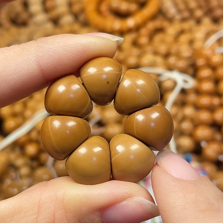 木微瑕太阳花手捻。