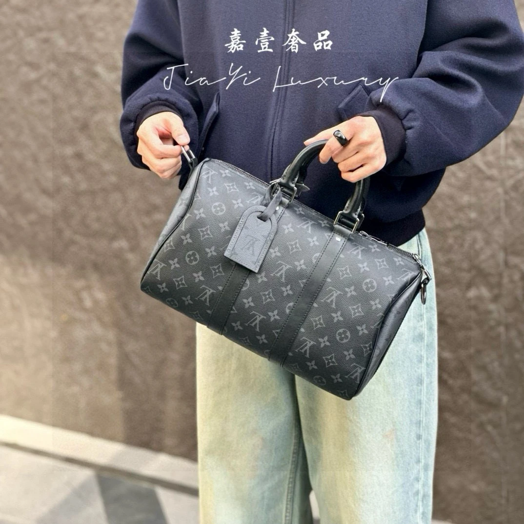 99新 LouisVuitton/路易威登 9046  keepall35 黑花斜挎包
