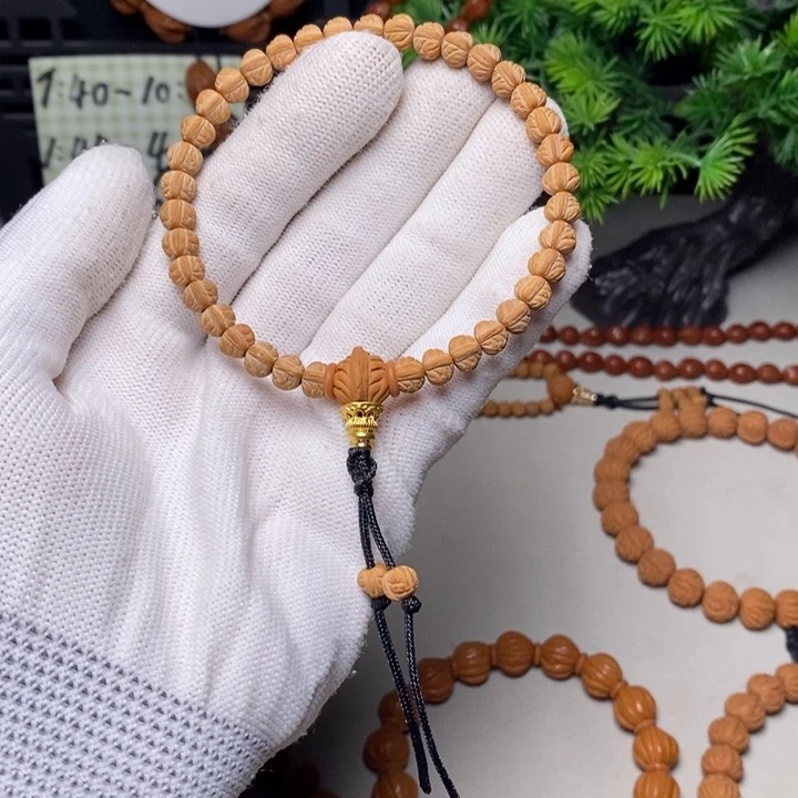 希***_桃核手串金蟾手持