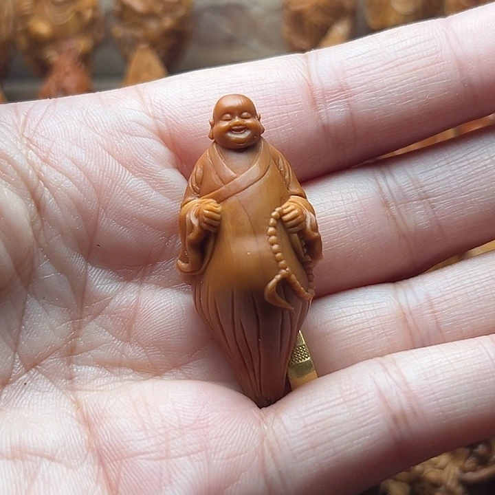 旭***哥吊坠橄榄核橄榄核