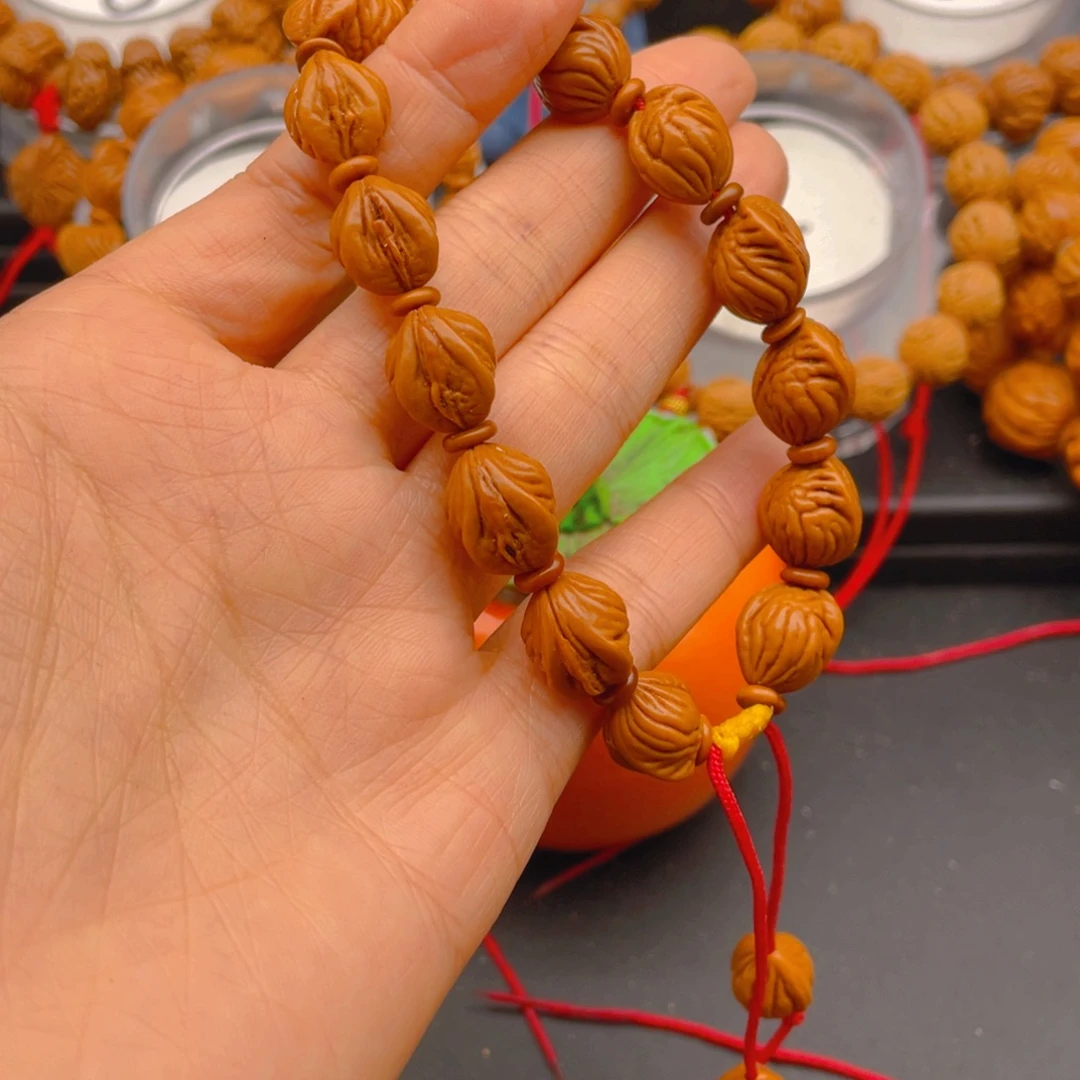 用***5吊坠桃核见健健康康平平安安3