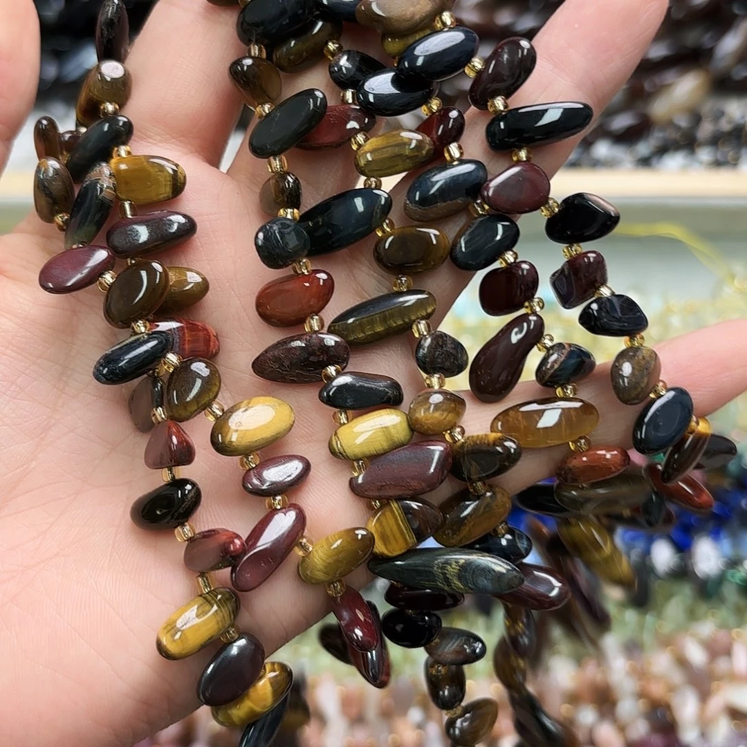 玛瑙/玉髓未镶嵌珠宝半成品三色虎大牙一条