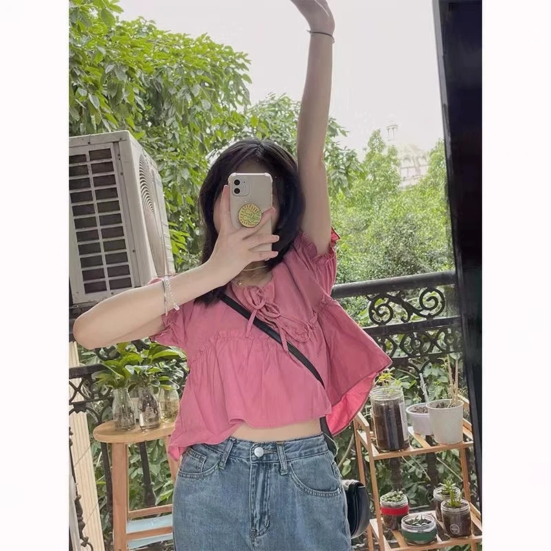 甜美气质百搭不规则别致设计感泡泡袖上衣