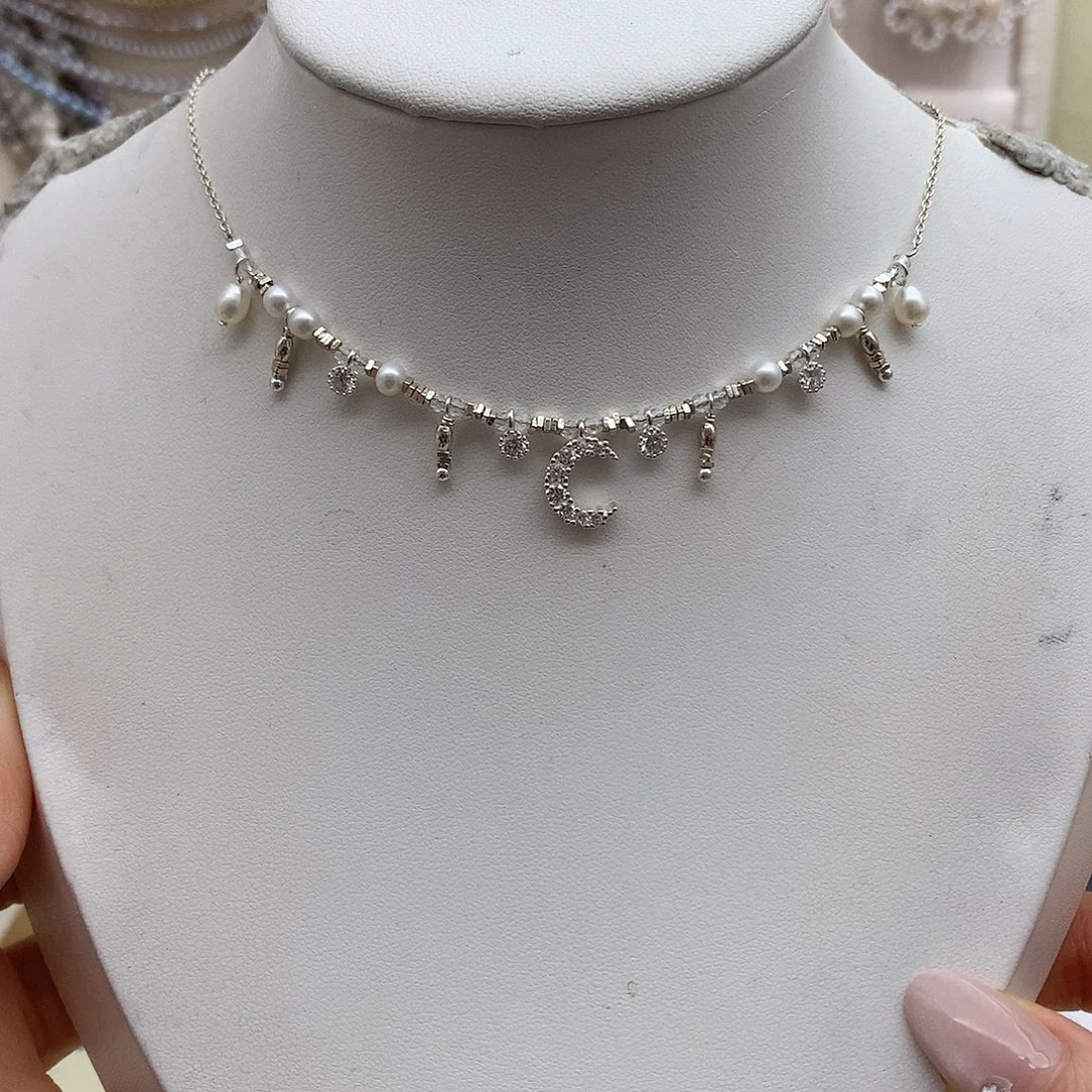 淡水珍珠银S925镶嵌耳饰