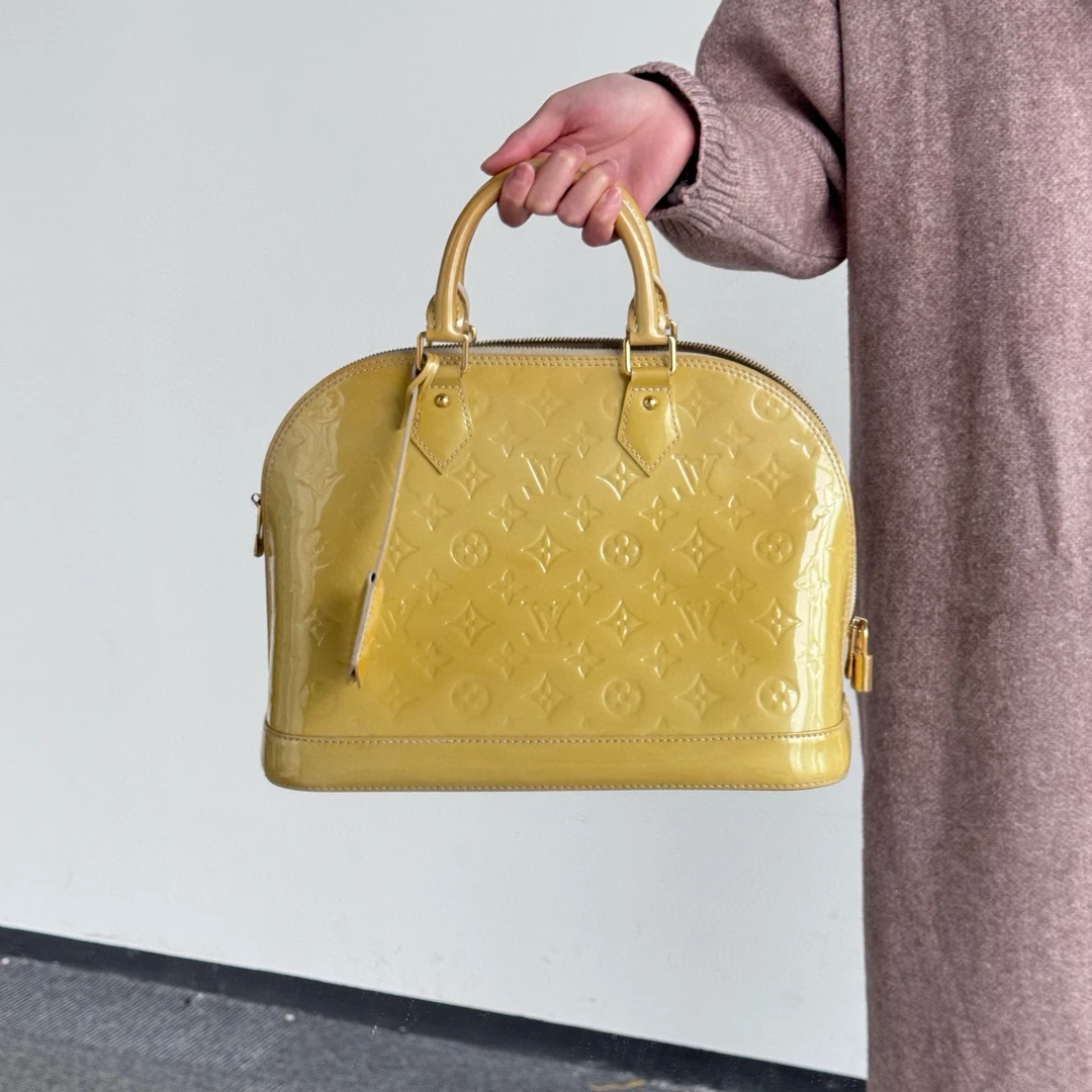 95新 LouisVuitton/路易威登 lv柠檬黄漆皮贝壳手提包