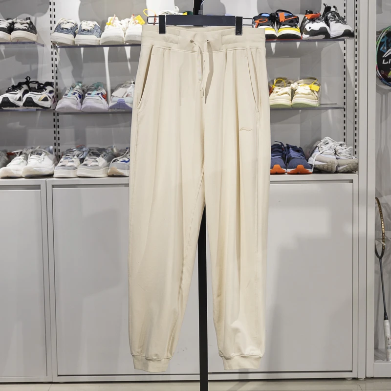 李宁女子卫裤2024春季新款健身系列束脚宽松透气运动长裤AKLU114