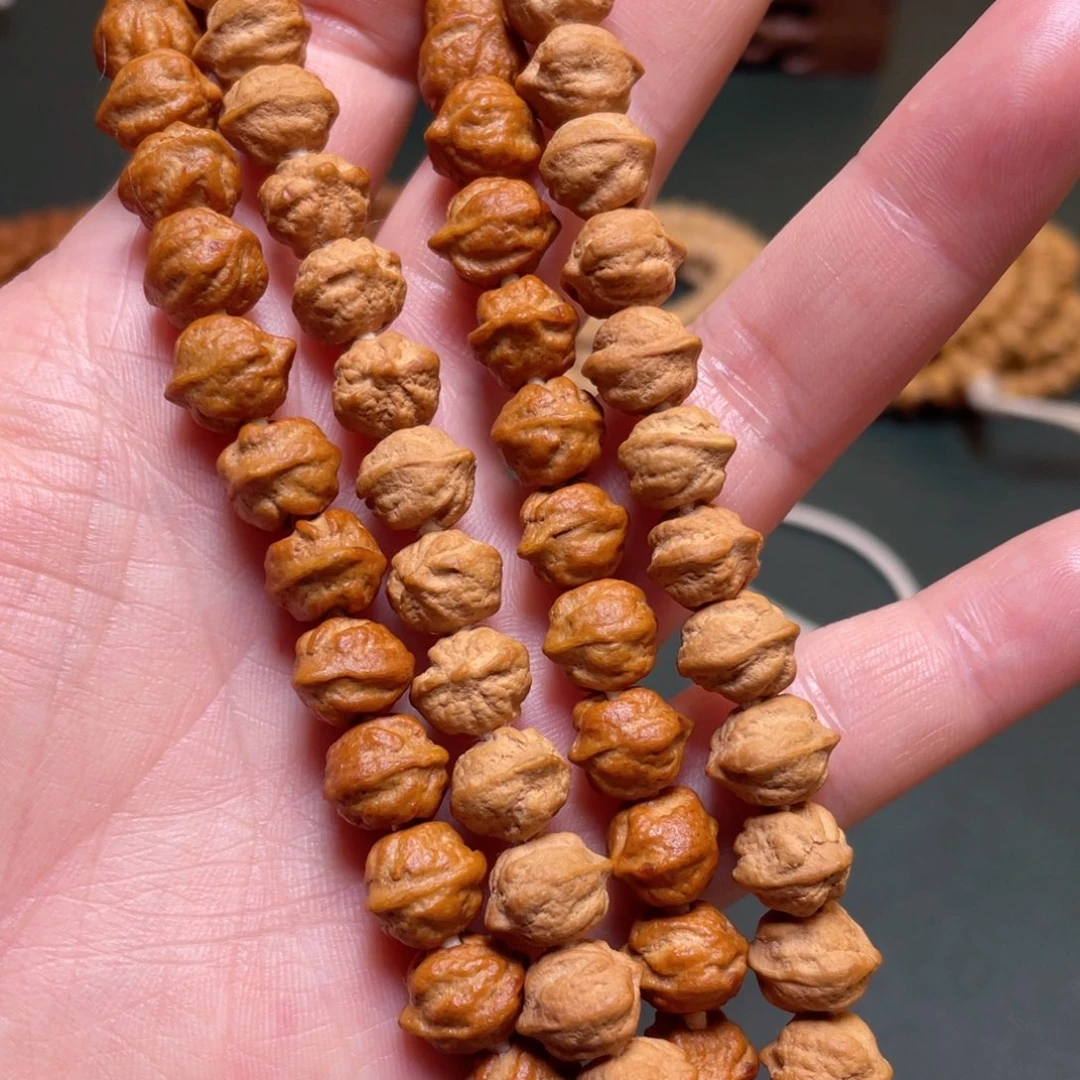 柏香籽/百香籽吊坠白牙横打手持