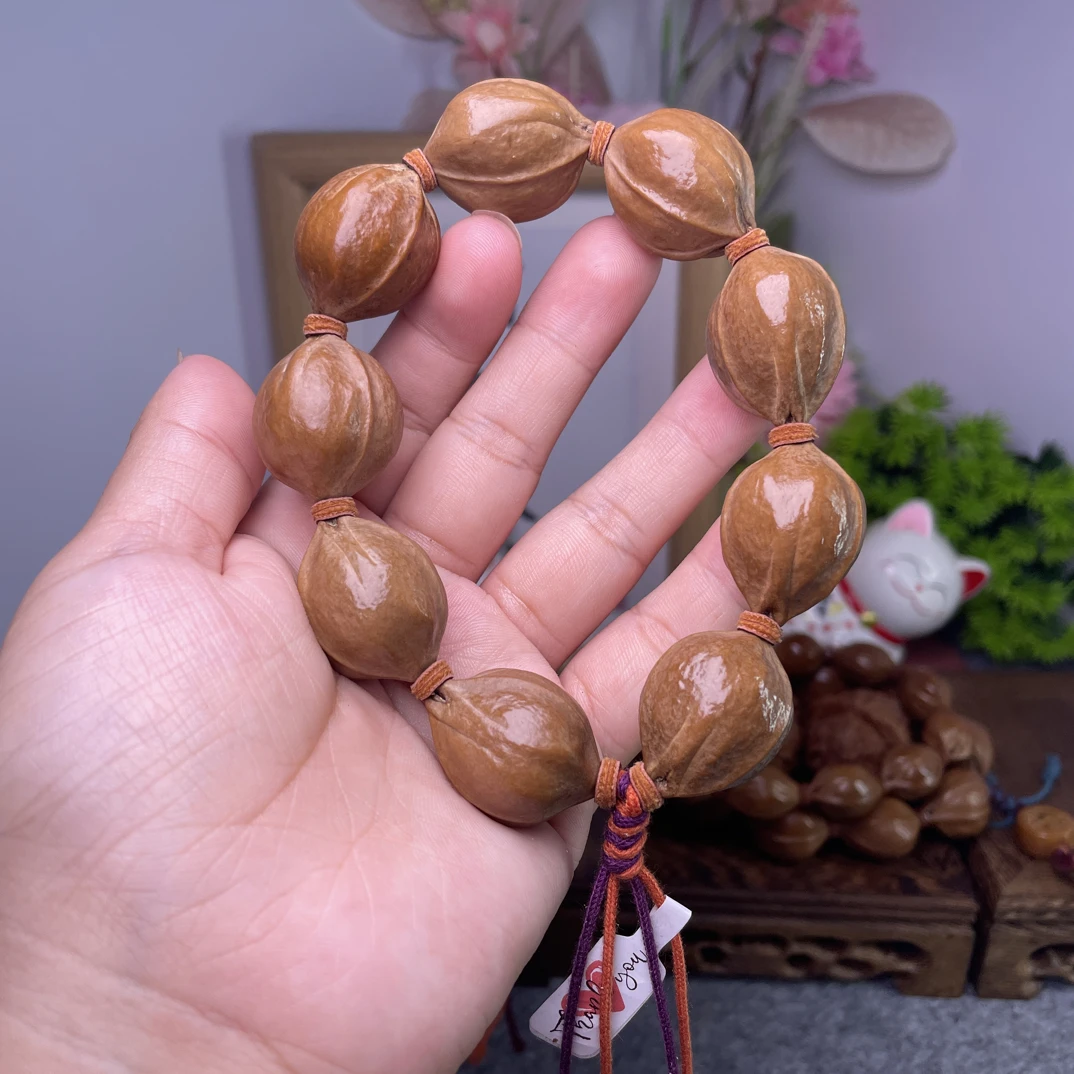梅林铁核原生态21*27三花鲨鱼背梅林铁核素串橄榄核素串