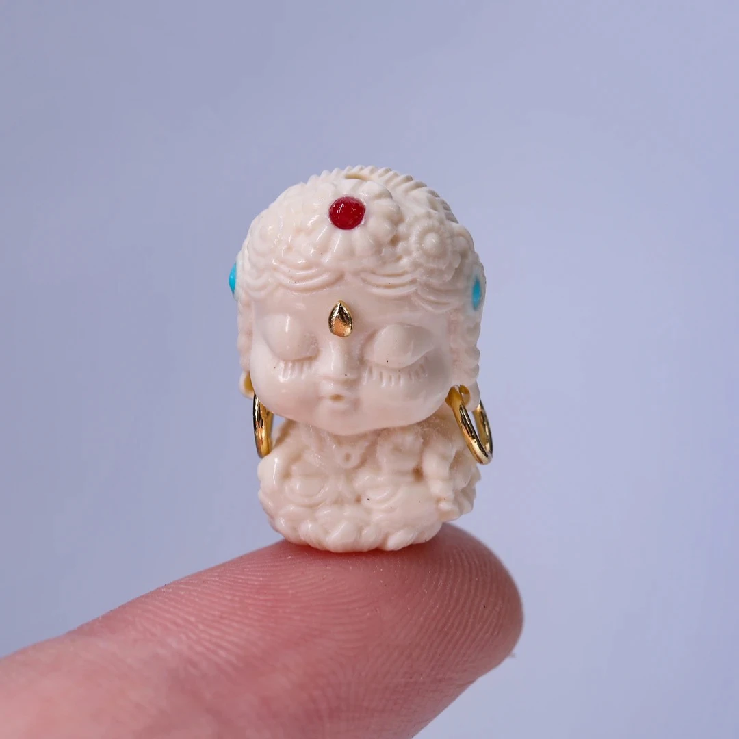 A318-O天然猛犸牙雕刻度母观音（上下孔）10.5×17mm假一罚十