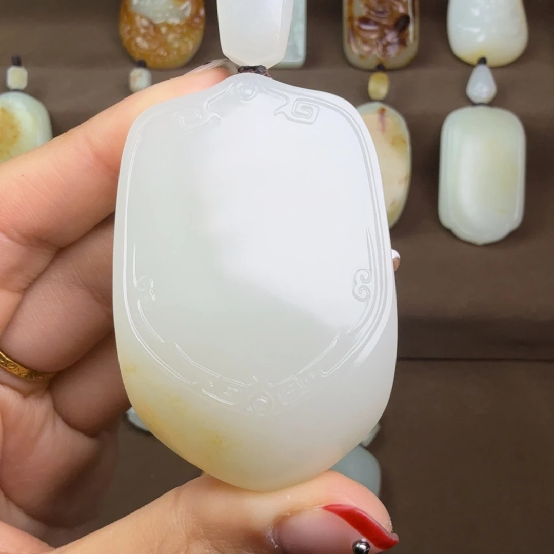 李***粟和田玉未镶嵌挂件