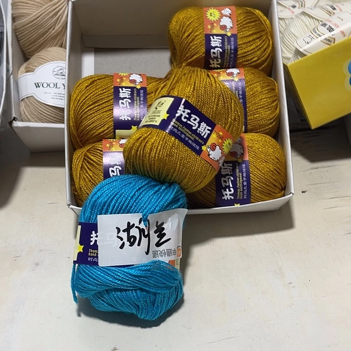 羊毛混纺格三个团子