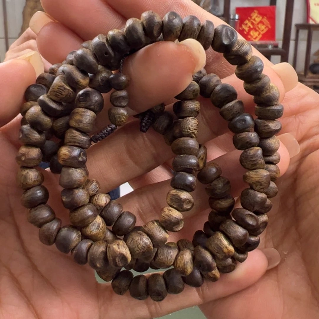 沉香手串乌身沉水树钉卡7/26g+